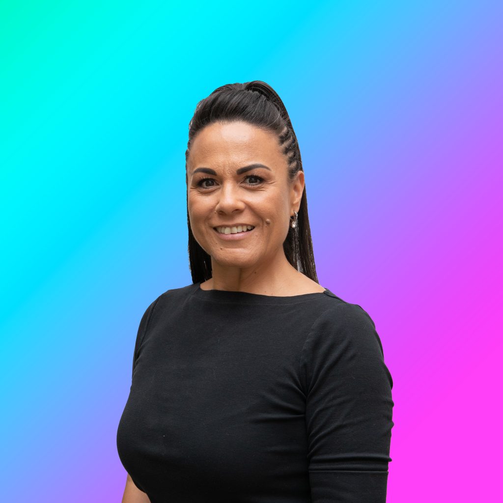 a woman smiling at the camera